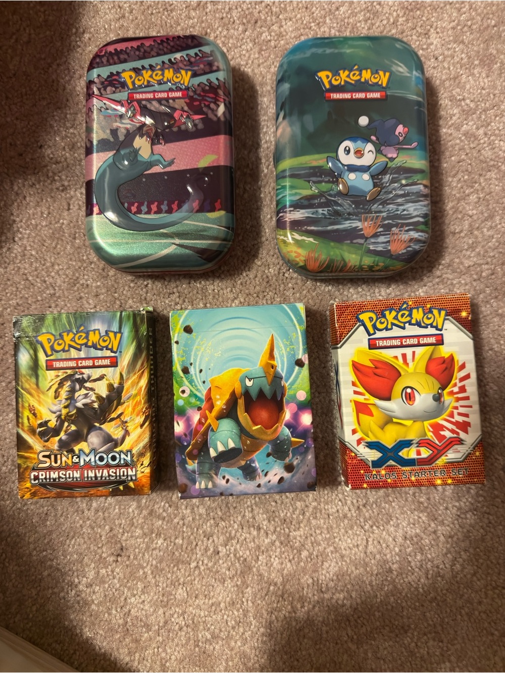Pokemon Card Tins and Booster Packs - Blue, Teal, Purple, Yellow, Red